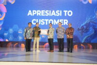 Foto bersama jajaran Kementerian Komunikasi dan Informatika (Kominfo) dan PT Pos Indonesia (Persero) di acara POSIND Day. Foto: Ist